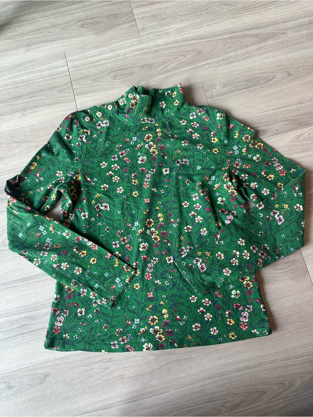 Anthropologie Green Floral Long Sleeve T fits like a S. Tag says M buts it’s a S